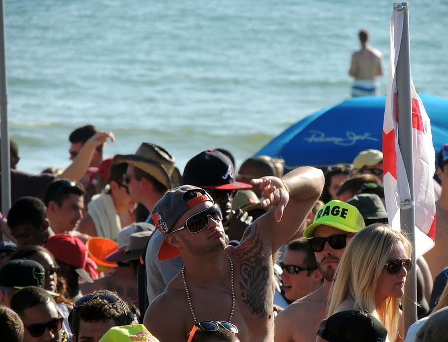 man showing hand sign, beach party, spring break, california, HD wallpaper