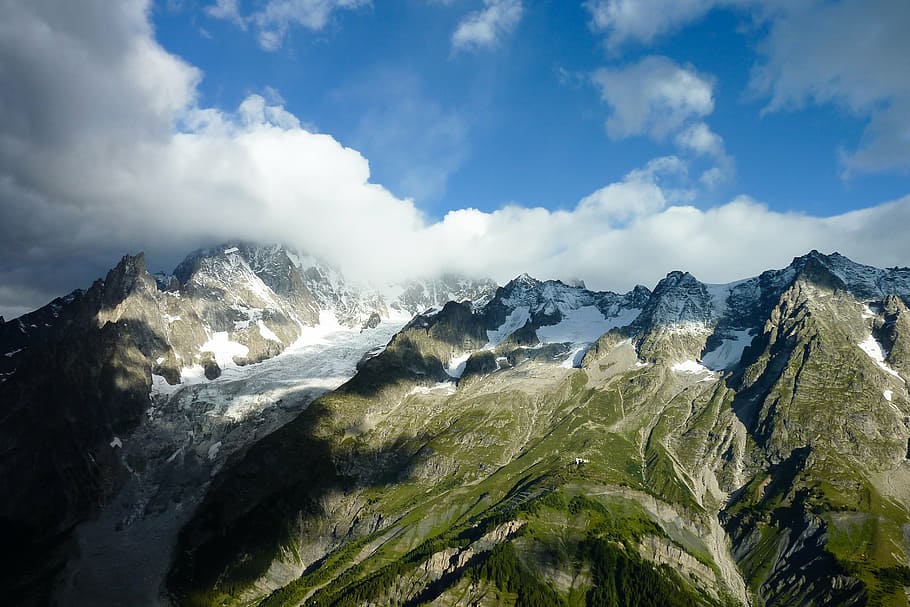 aerial photo of snow covered mountain during daytime, landscape HD wallpaper