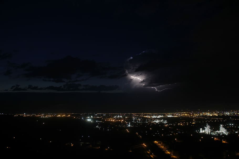 photo of lightning above city, aerial view of buildings, night HD wallpaper