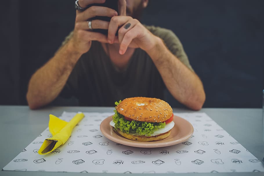 hamburger on saucer plate, Breakfast, bun, meal, man, table, food, HD wallpaper