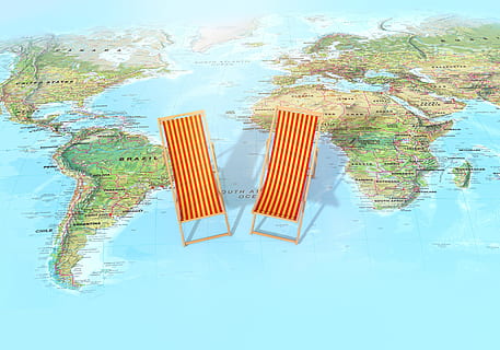 photo of two brown wooden lounge chairs on world map, ocean HD wallpaper
