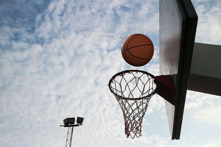 white basketball system under cloudy skies, circle, throw, sports