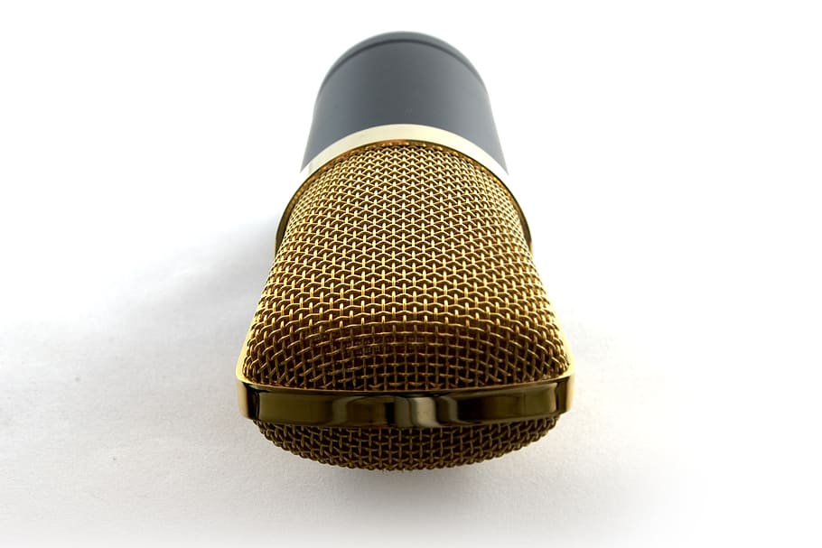 HD black and gold condenser microphone on white surface, vocal, music Flare