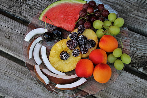 assorted fruits on plate placed on wood plank, appetizer, fresh HD wallpaper