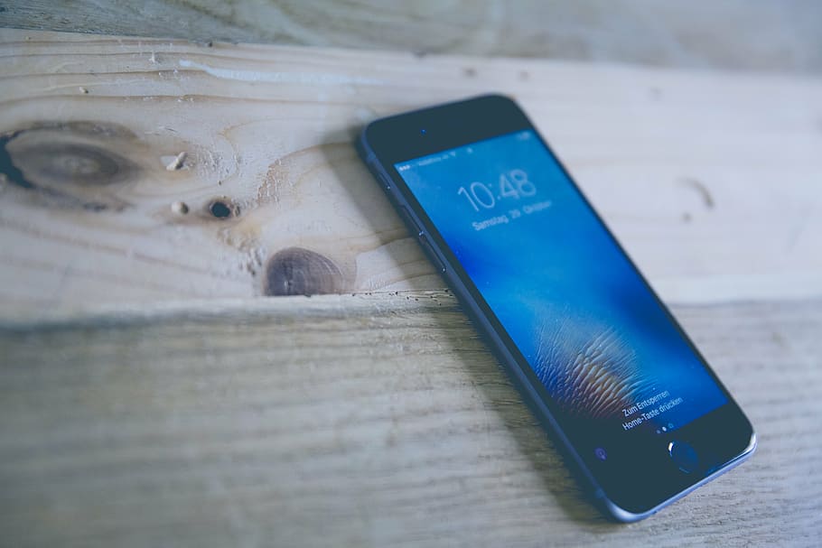 turned-on space gray iPhone displaying 10:48, mobile, camera HD wallpaper
