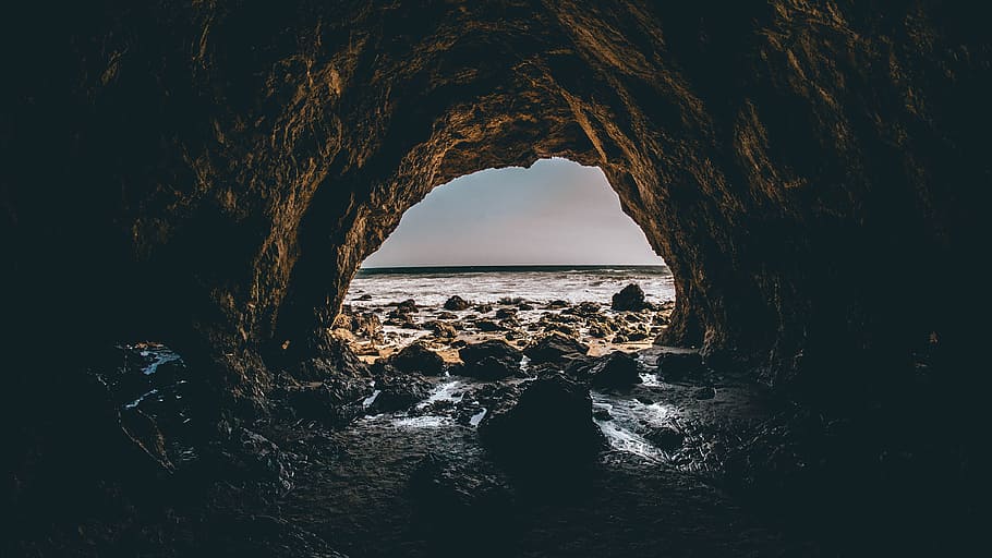 sea shore cave, brown cave at daytime, exploring, nature, coastline HD wallpaper