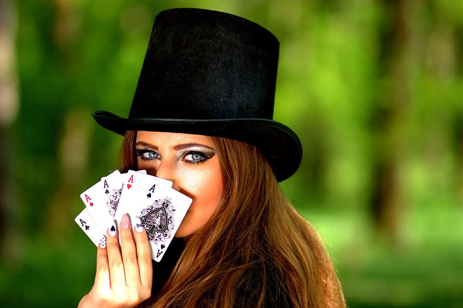 woman holding playing cards, girl, topper, luck, poker, ace, portrait