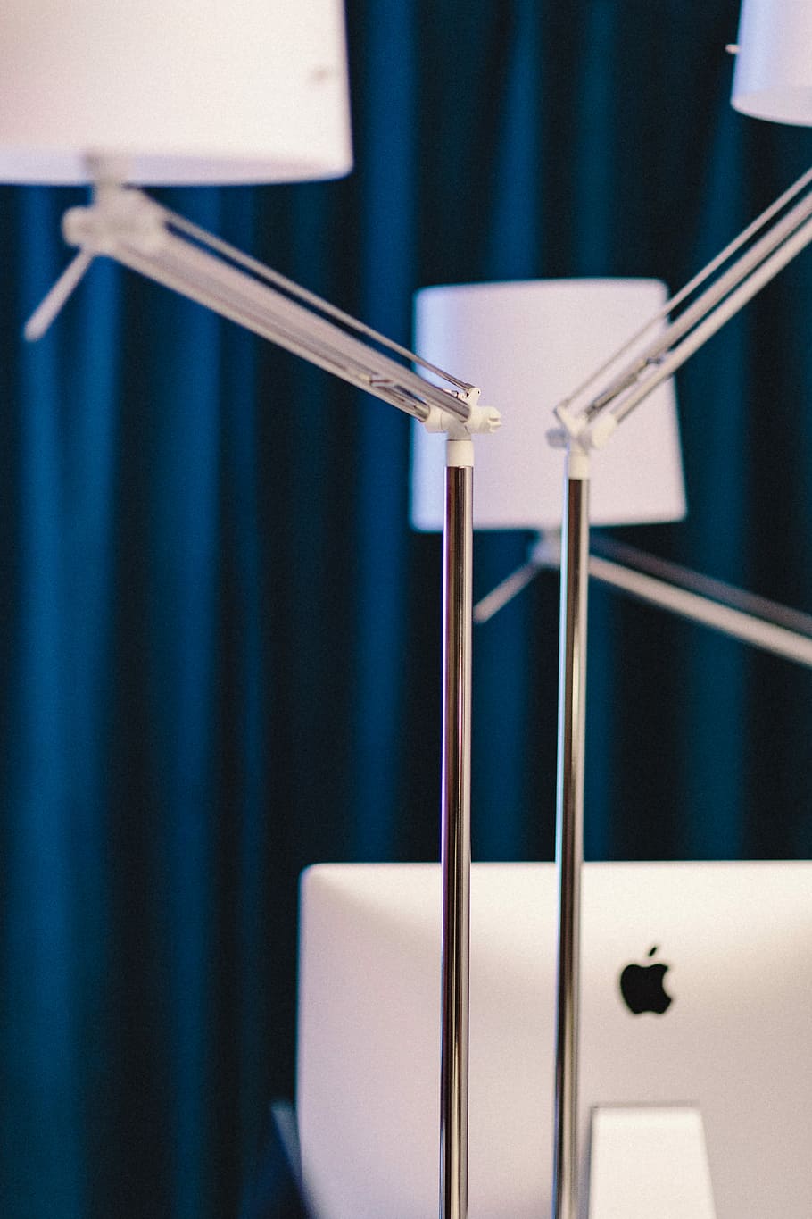 Closeup view of white lamps in the office, Apple iMac, workspace HD wallpaper