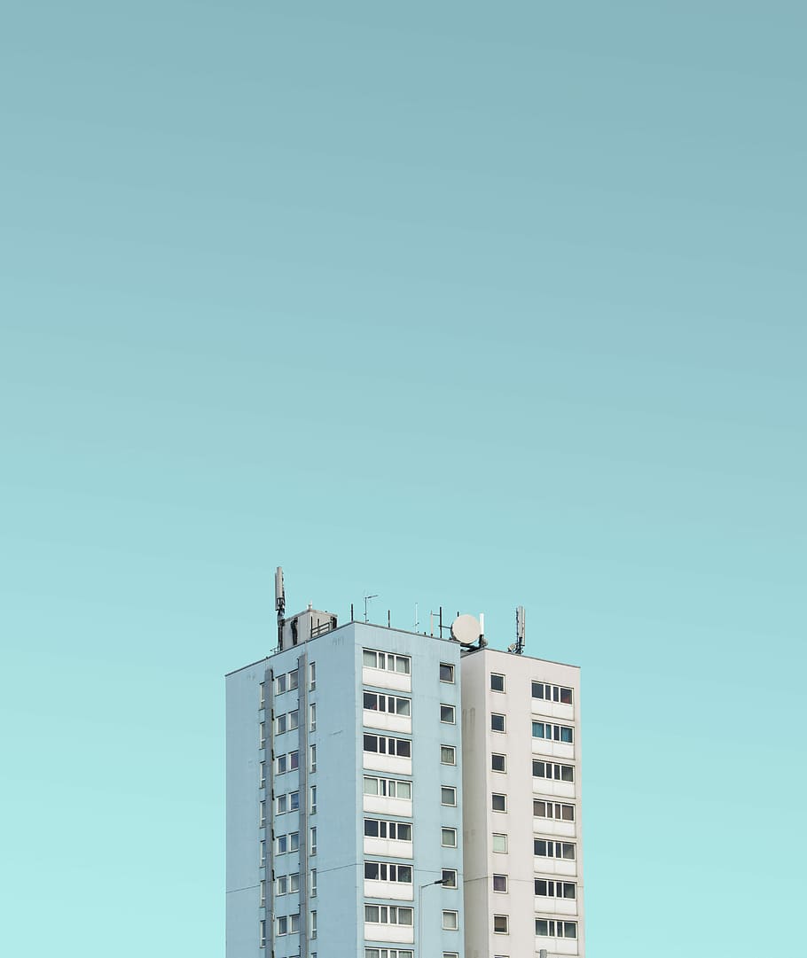white painted high-rise building under clear sky, aerial photography of white building HD wallpaper