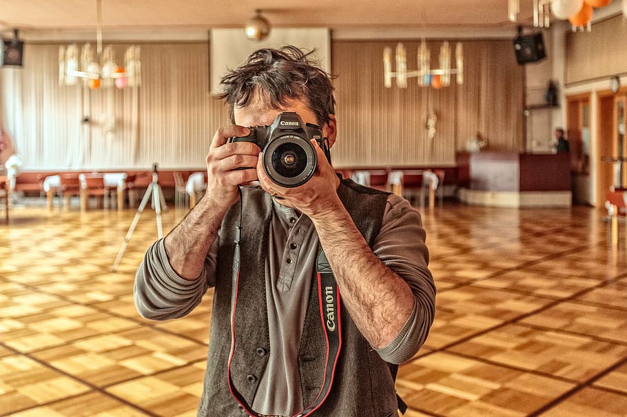man taking photo using Canon bridge camera, photographer, lens, HD wallpaper