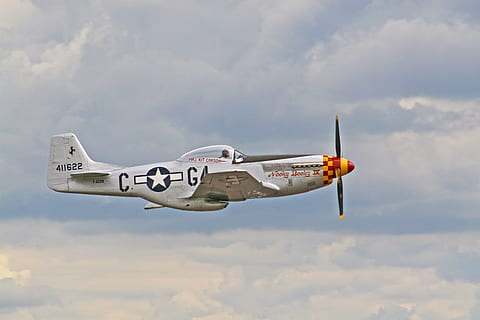 silver propeller jet fighter above white clouds, grey and white airplane HD wallpaper