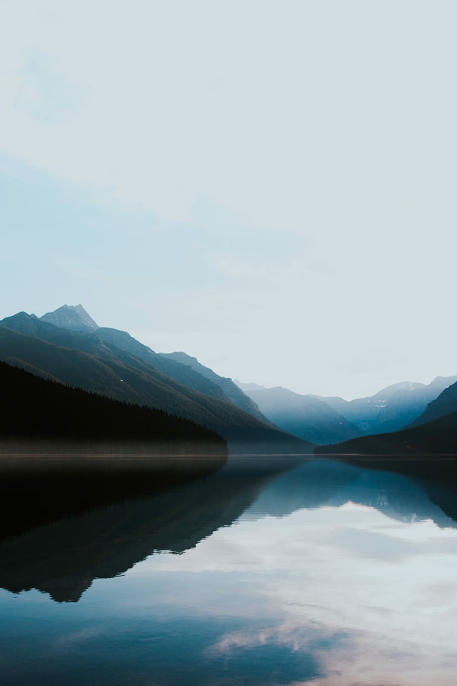mountains surrounded by body of water, photo of body of water and mountains HD wallpaper
