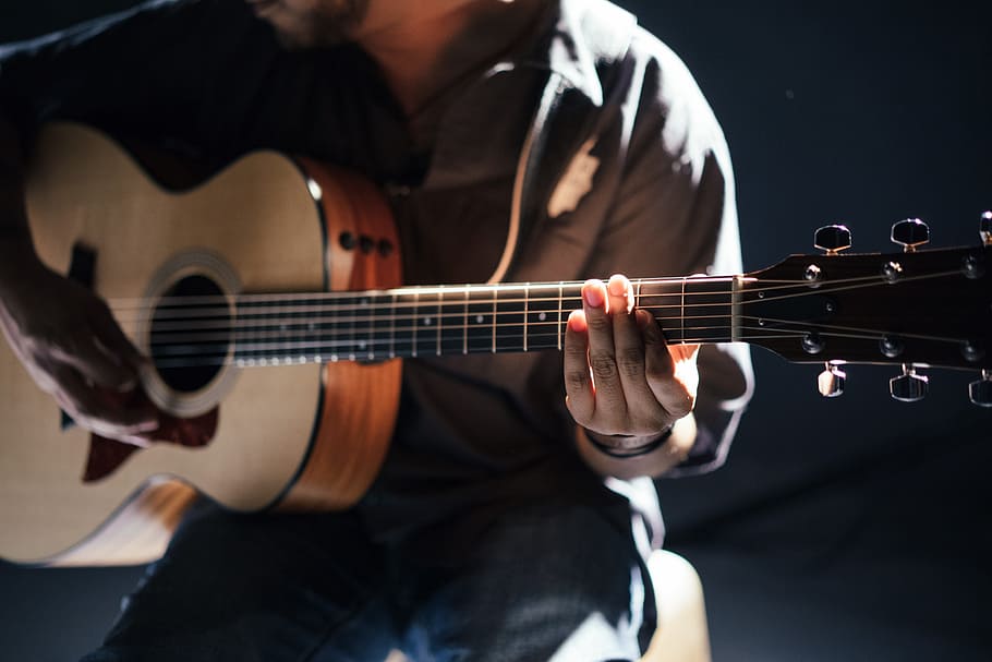 man sitting while playing guitar, acoustic, band, guitarist, instrument