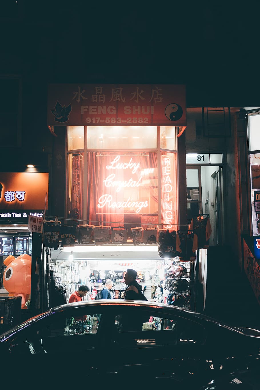 person standing outside near assorted bags, man standing in front Feng Shui store HD wallpaper