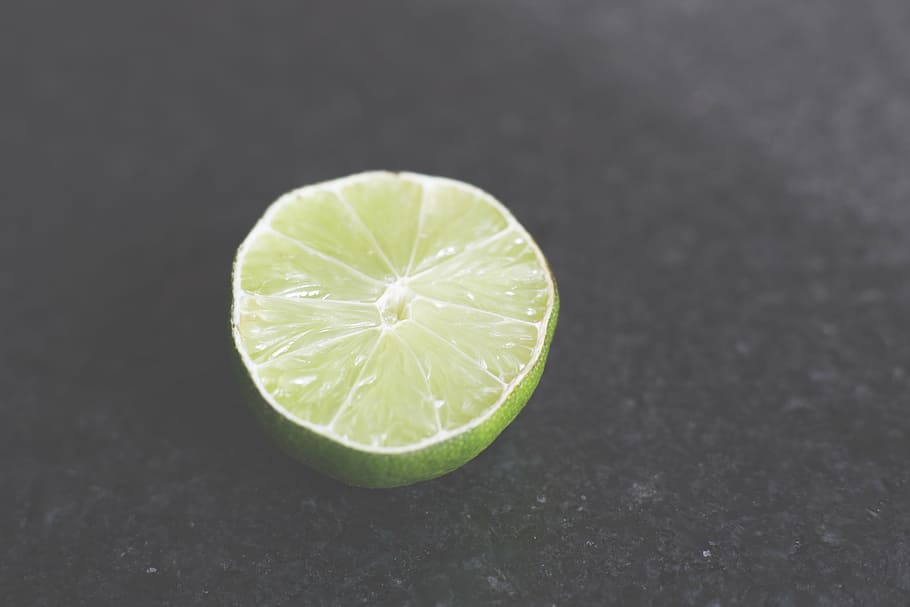 slice lemon on gray surface, citrus, fruit, lime, juice, food HD wallpaper