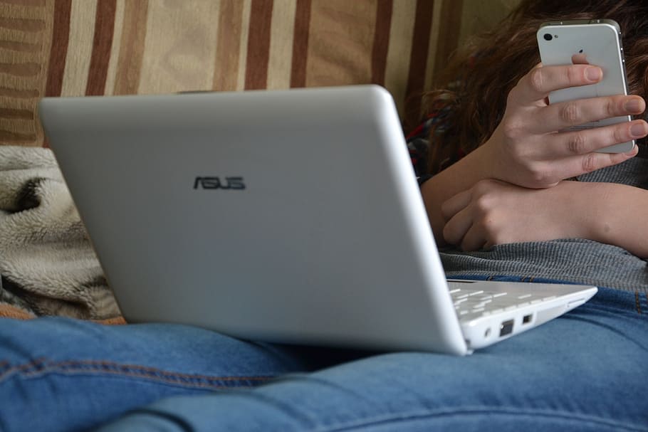 person using white Asus laptop computer, iphone, telegon, iphone 4 HD wallpaper