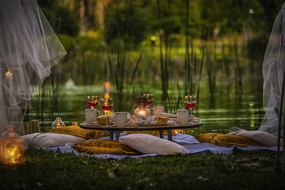 dining table near pond with throw pillows, a toast, green, nature HD wallpaper