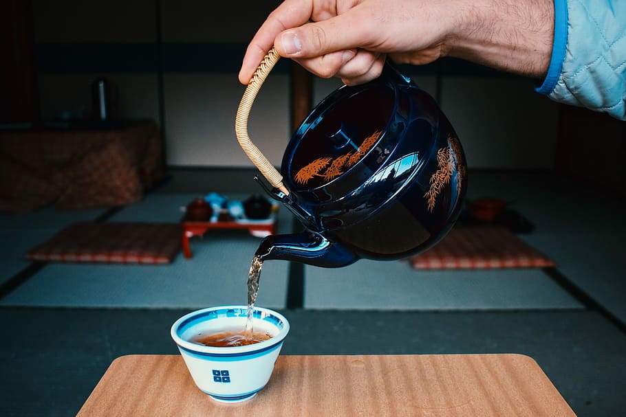person pouring tea on cup, drink, hot, hand, caucasian, teapot HD wallpaper