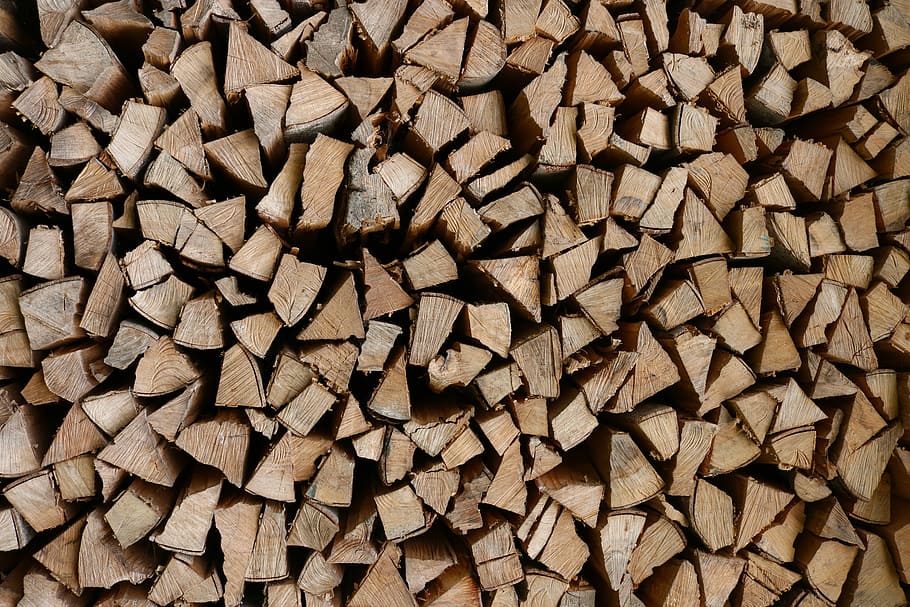 closeup photo of firewoods, firewood cord, split wood, wood stack