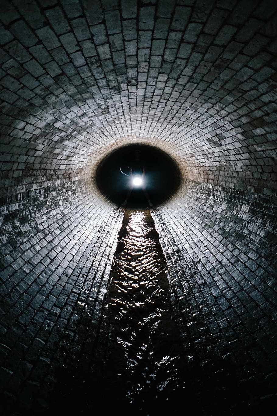person standing inside tunnel, bricked, wall, water, ways, overlooking HD wallpaper