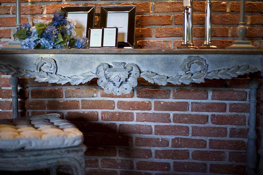 several assorted photo frames on gray wooden wall shelf, chair HD wallpaper