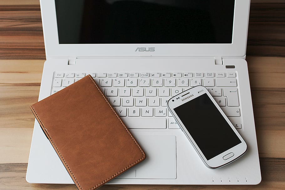 white ASUS laptop with Samsung Galaxy smartphone band brown leather case HD wallpaper