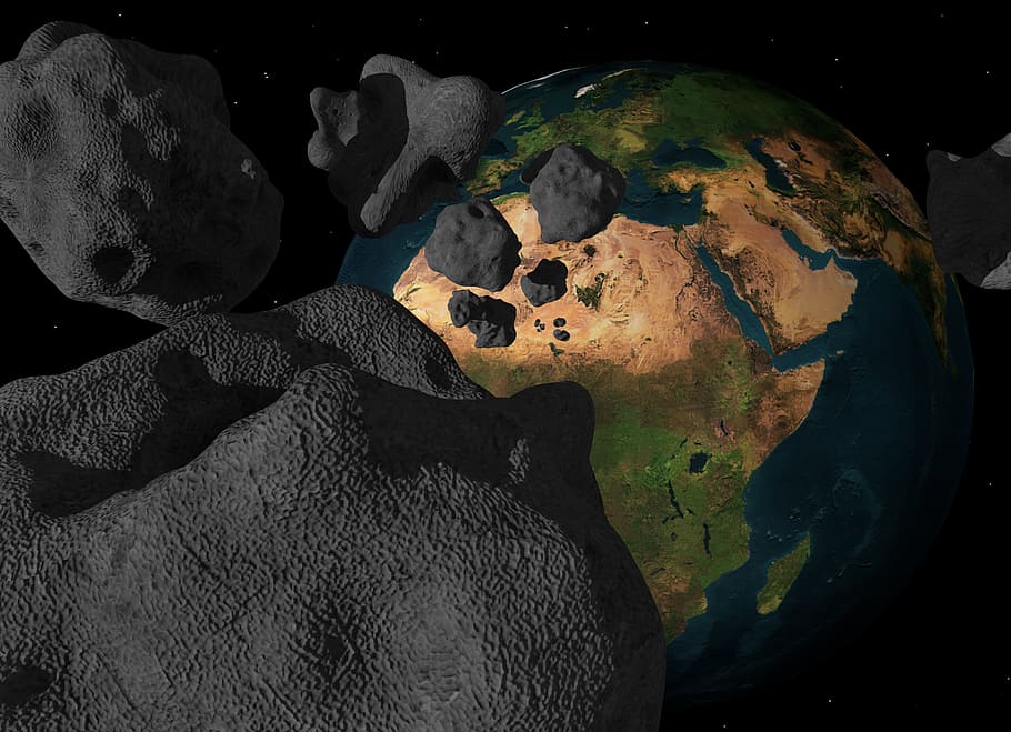 green, brown, and blue Earth planet, asteroid, meteorite, impact