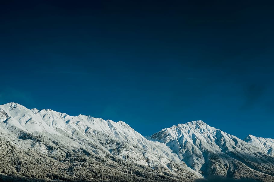 aerial view of snowy mountain peaks, mountain covered by snow at daytime HD wallpaper