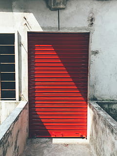 closed red roller shutter, red roller shutters, entrance, wall HD wallpaper