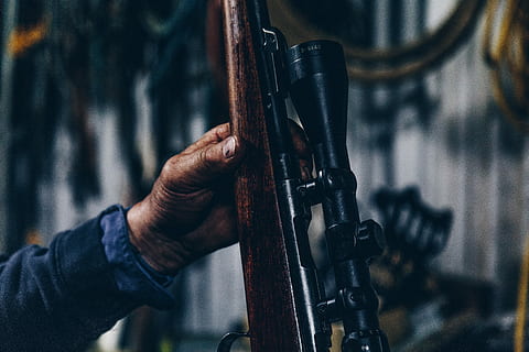 person holding brown and black hunting rifle, person holding brown hunting rifle HD wallpaper