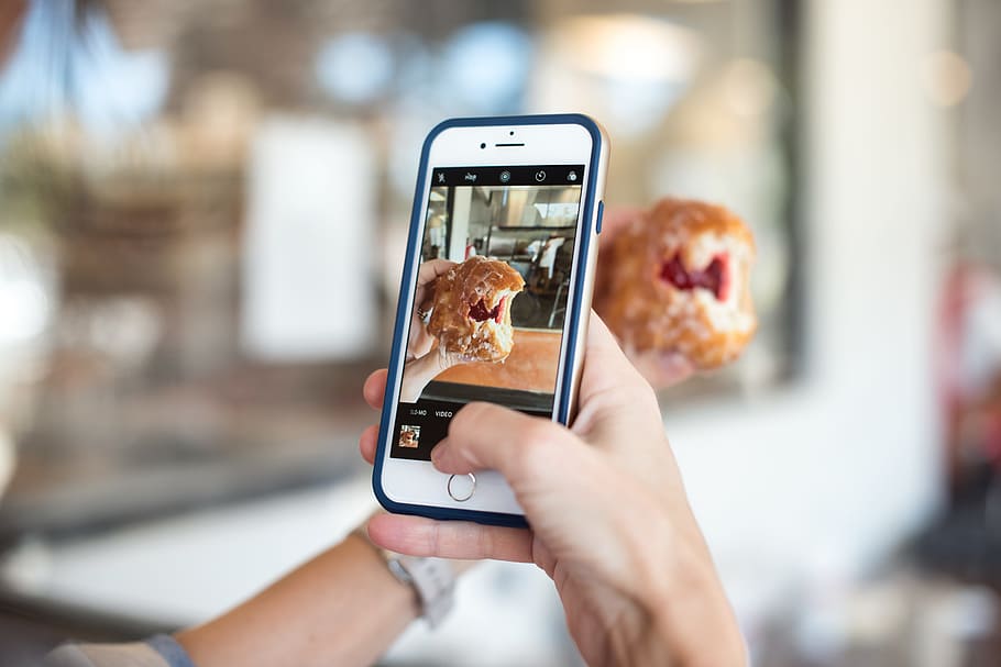 selective focus photography of person taking picture of brown food, person taking photo of a pie, HD wallpaper