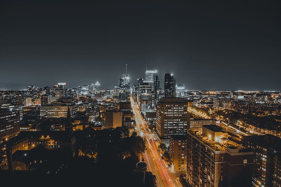 Montreal at Night, time lapse photography of vehicle passing through building HD wallpaper