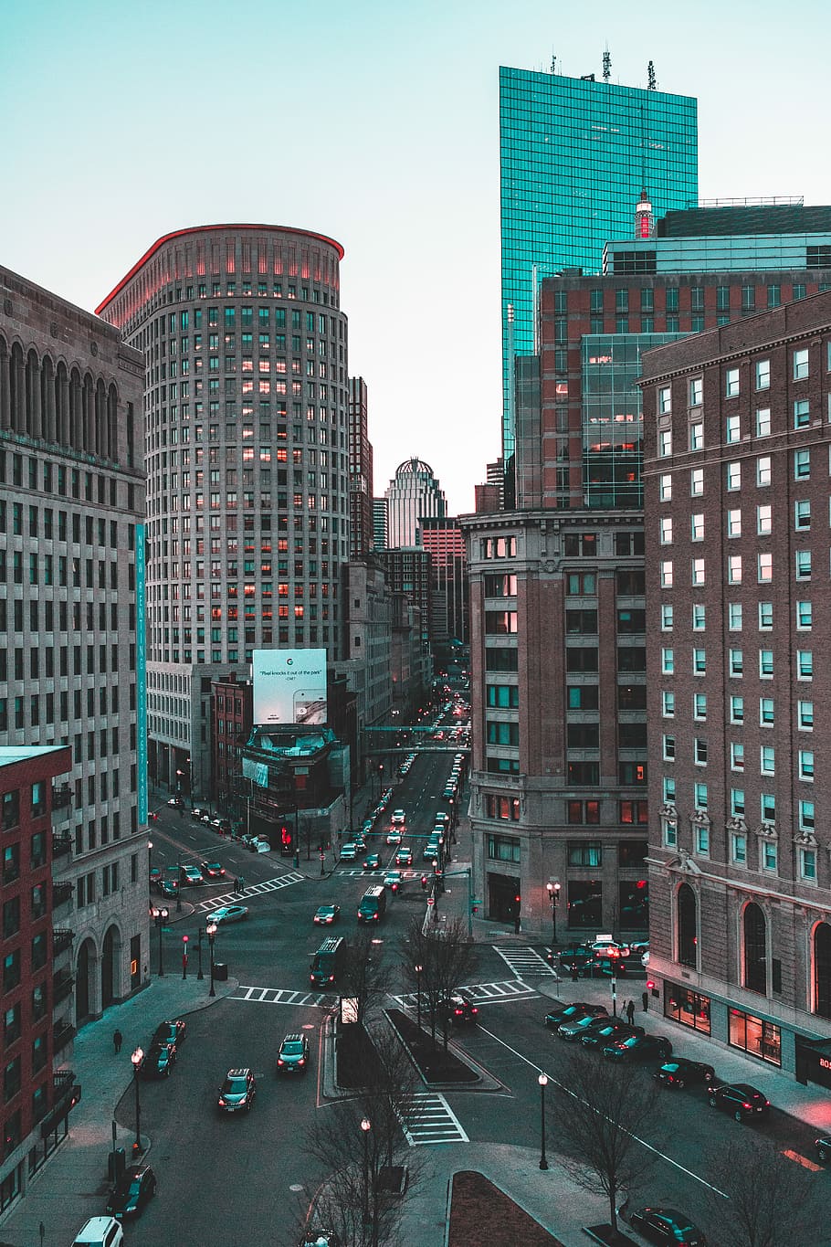 city building during daytime, aerial view of road intersection near buildings HD wallpaper