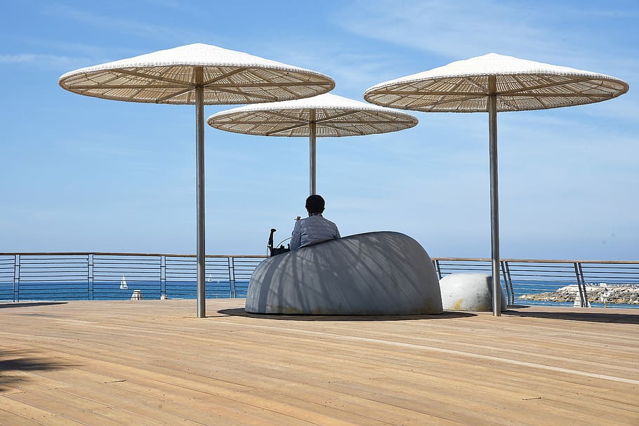 person sitting on chair under umbrella, beach, sea, water, sky HD wallpaper