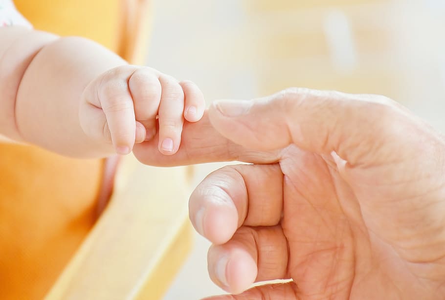 baby holding person's index finger, hand, infant, child, father, HD wallpaper