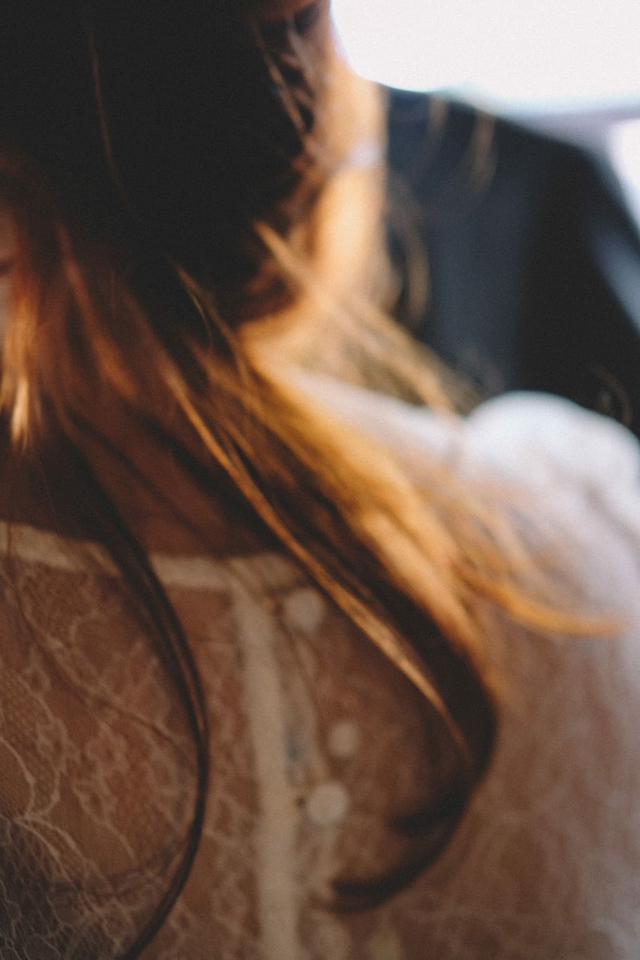 woman wearing white top, woman wearing white lace top, blur, hair