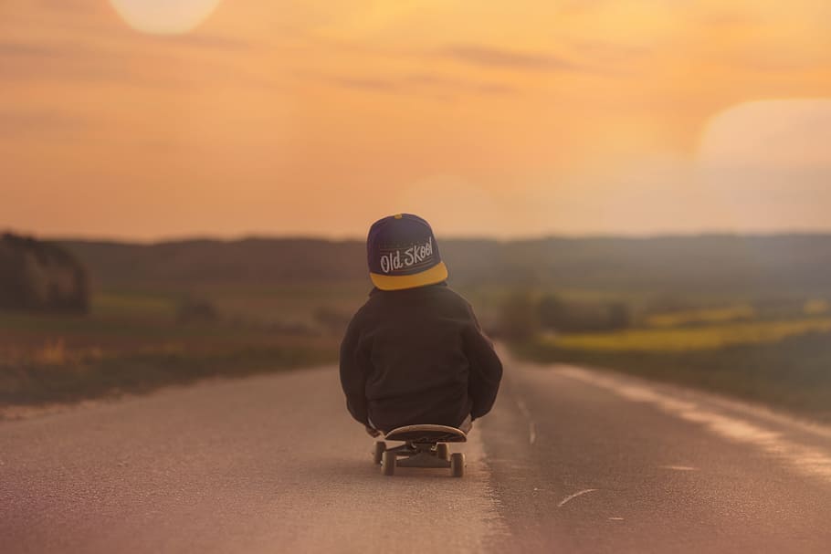 Child in Black Jacket Blue Yellow Old School Print Fitted Cap Riding Skatebaord HD wallpaper