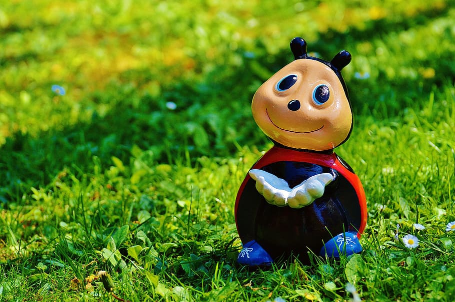 ladybug character toy on grass at daytime photo, figure, funny HD wallpaper