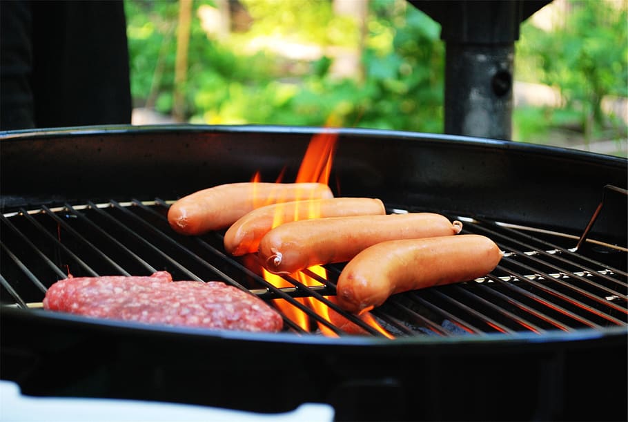 grilling hot dogs and hamburgers