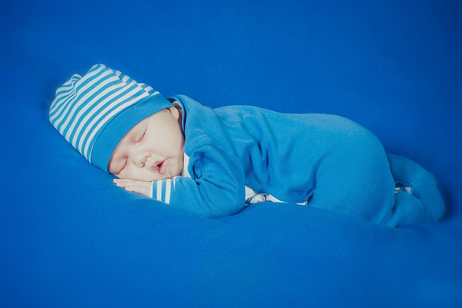 baby in blue and white striped footsie sleeping, boy, newborn