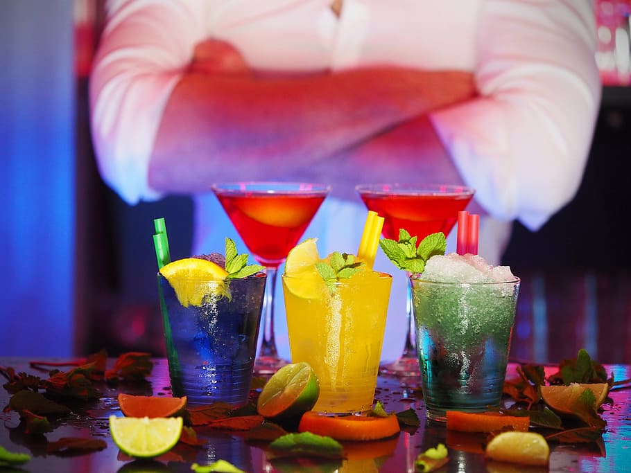 selective focus photography of five assorted-flavor drinks surrounded by lemon slices HD wallpaper