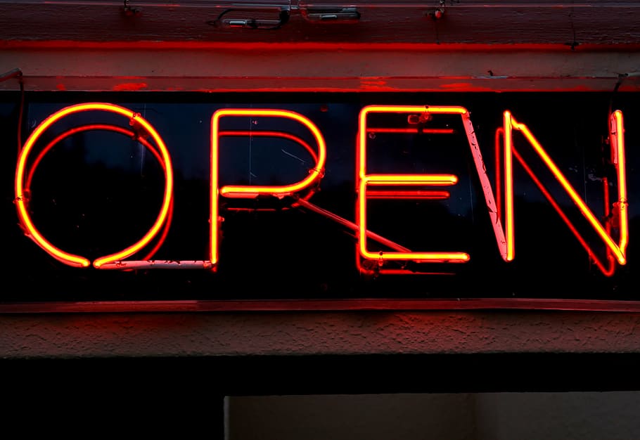 yellow and red Open LED signage mounted on wall, alcohol, bar