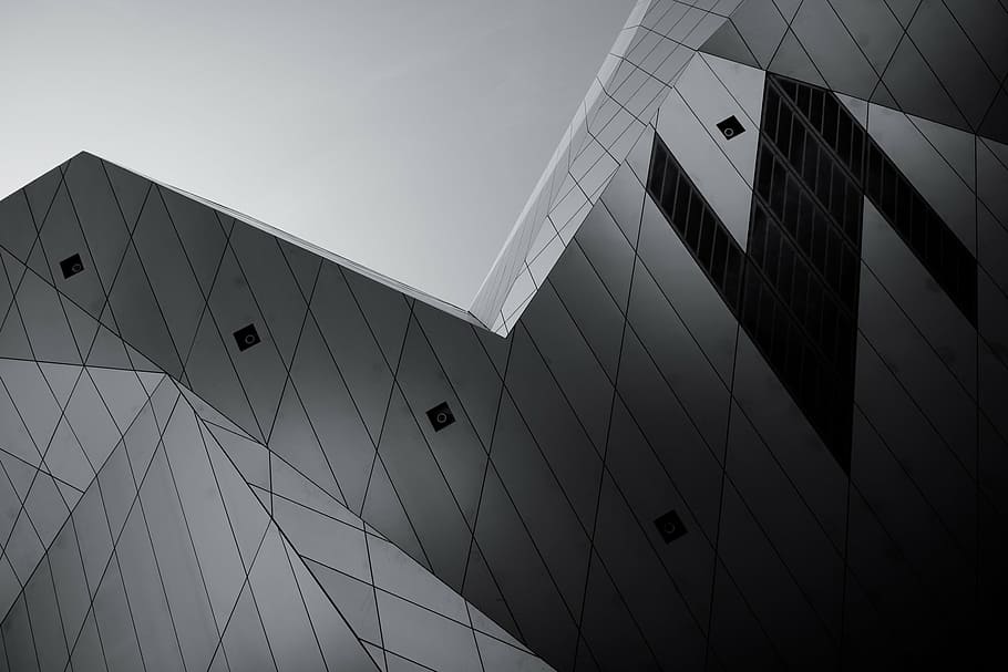 low-angle and grayscale photography of curtain wall building HD wallpaper