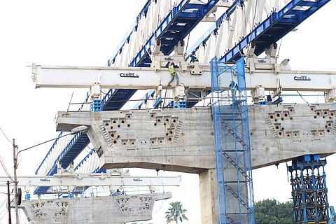 white and blue bridge construction during daytime, workers HD wallpaper