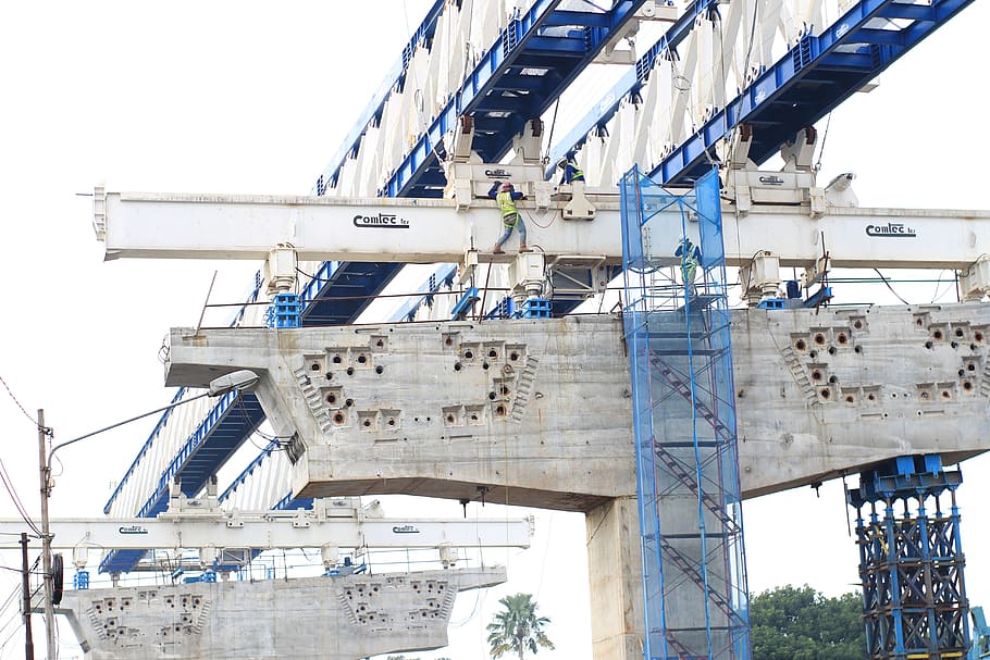 white and blue bridge construction during daytime, workers HD wallpaper