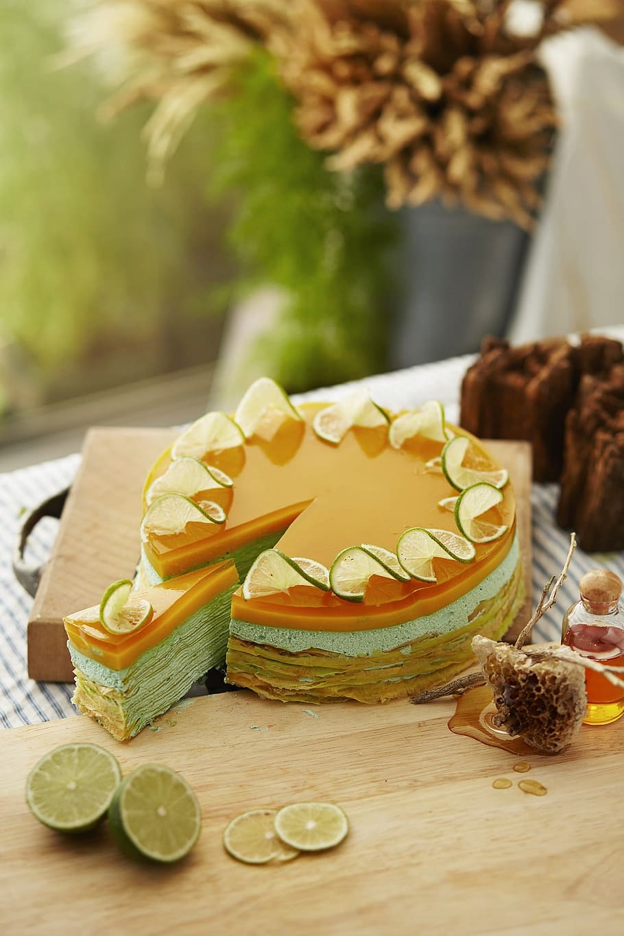 sliced of gray and orange lemon cake on brown table, sweets HD wallpaper