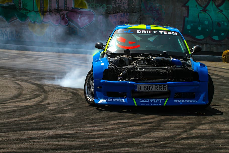blue and yellow racing car on gray racing trach, drift, auto HD wallpaper