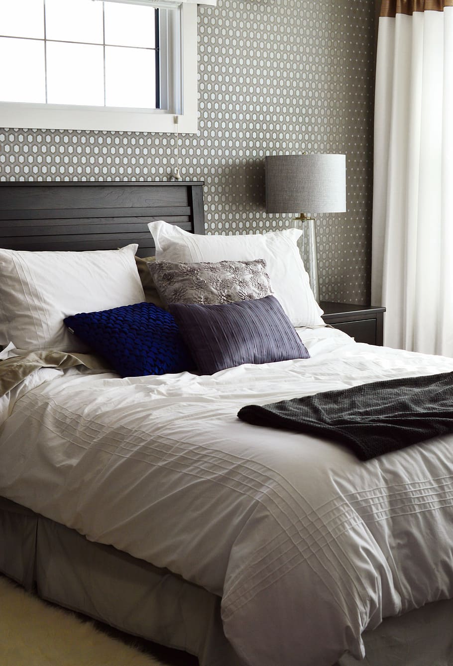 black bed frame with white comforter set, bedroom, home, house