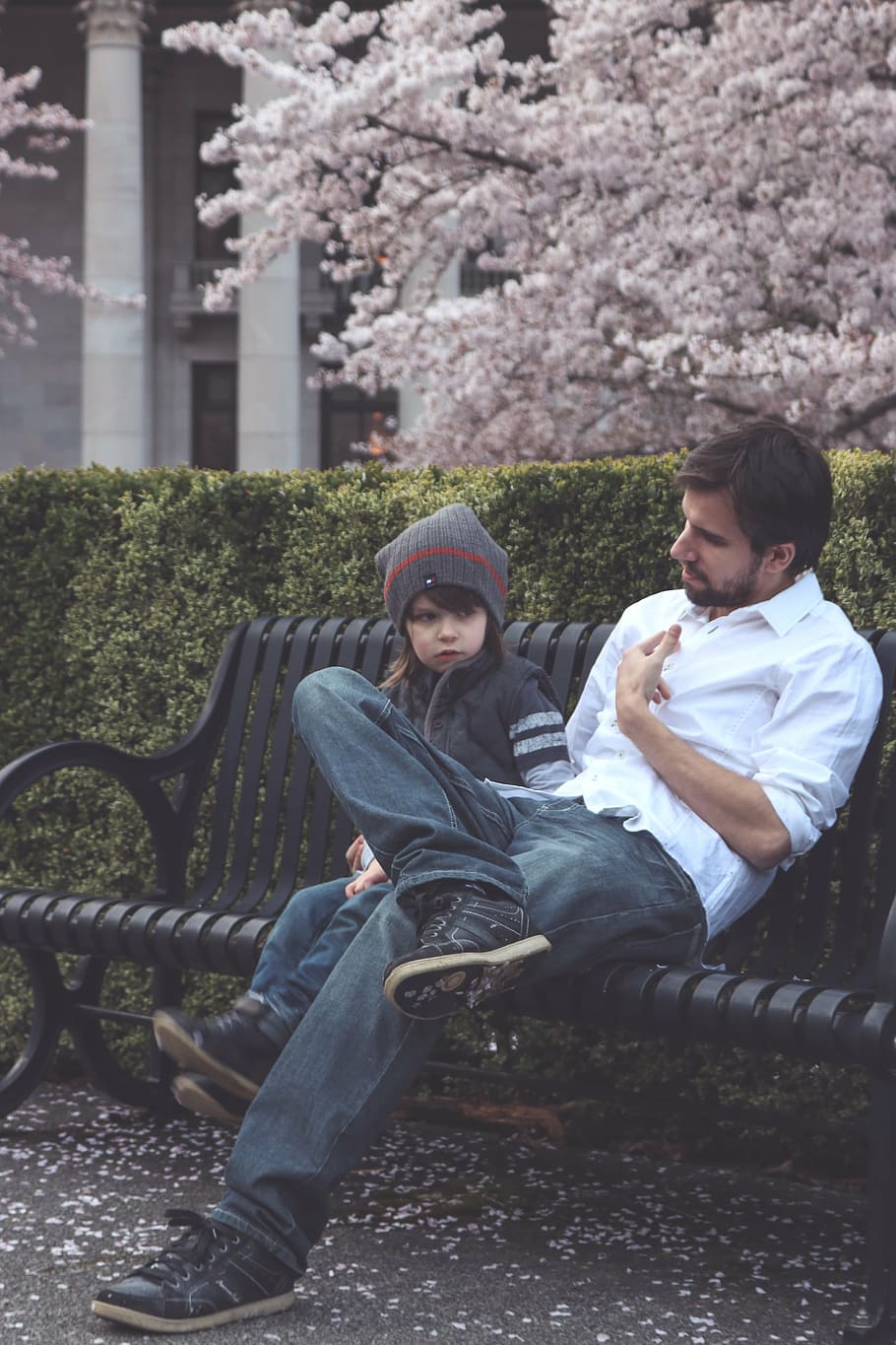 man sitting next to girl on bench outdoors, father, son, bloom HD wallpaper