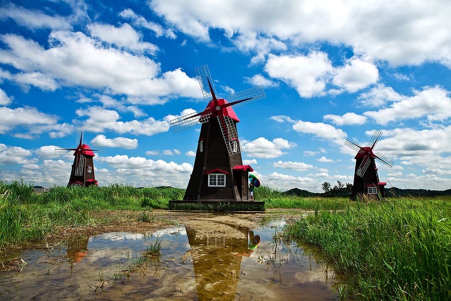 three brown-and-red windmills photo during daytime, sky, cloud HD wallpaper